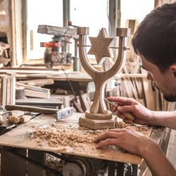 male-carpenter-working-with-wood-product-hand-tools (1)